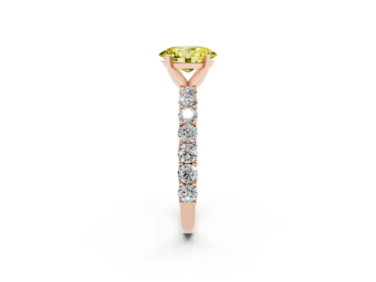 Fancy Yellow Oval Cut Diamond Solitaire Ring with Shared Prong Pavé Band and Four-Prong Setting Rose gold