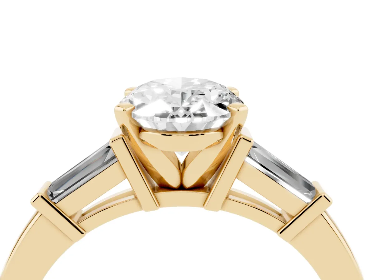 Oval Cut Cut Diamond Solitaire Ring with Tapered Baguette Accents and Four-Prong Setting Yellow gold