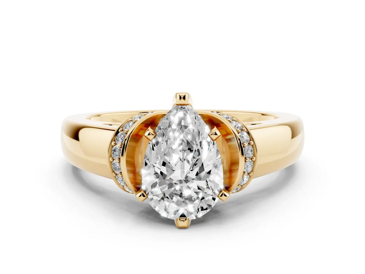 Pear Cut Solitaire Diamond Ring with Pave Band and Six-Prong Setting Yellow gold
