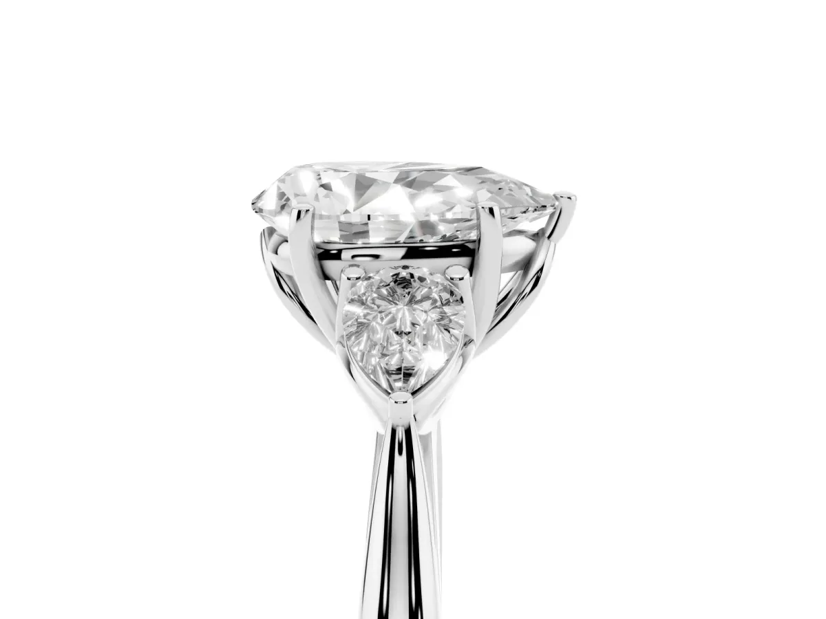 Three-Stone Pear Cut Diamond Ring with Pear Side Stones in Four-Prong Setting Silver
