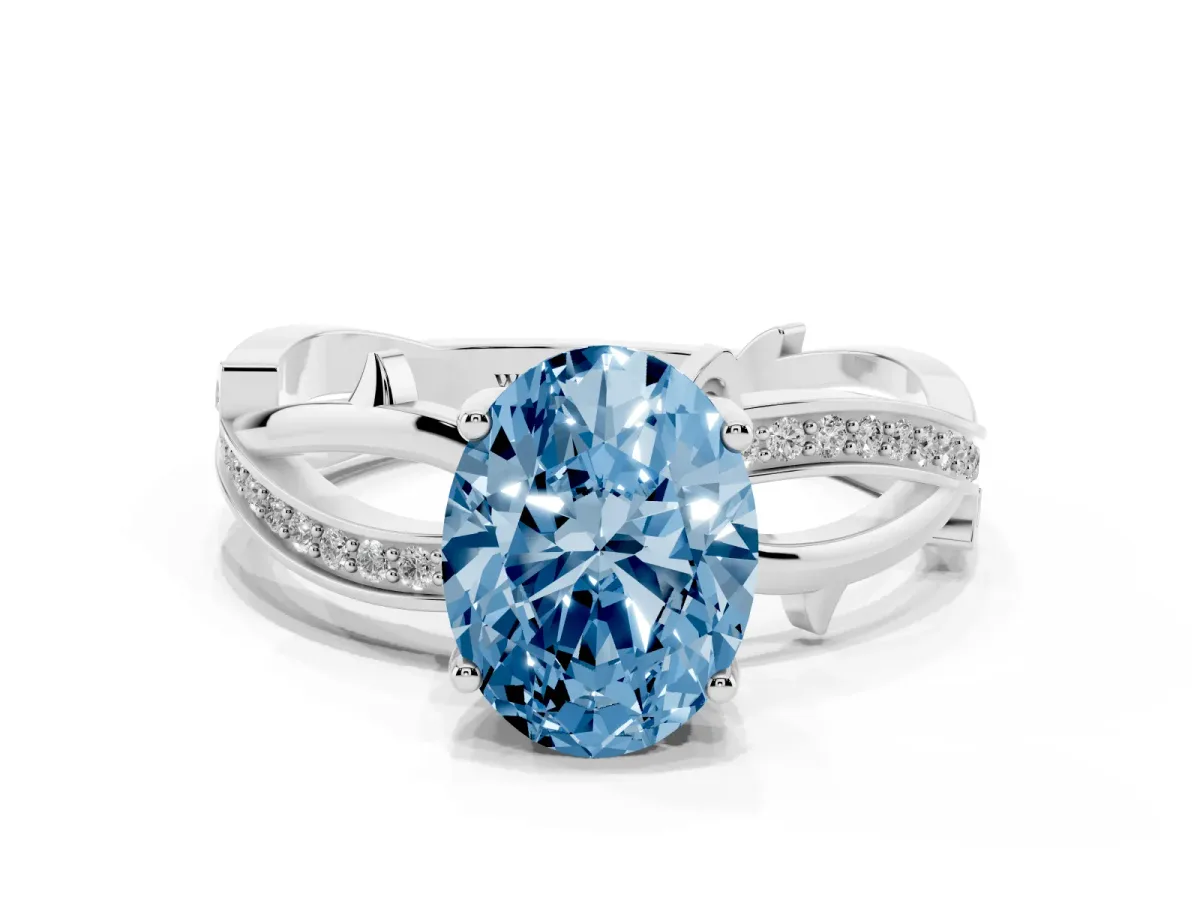 Fancy Blue Oval Cut Solitaire Twist Band with Pavé Accents and Four-Prong Setting White gold
