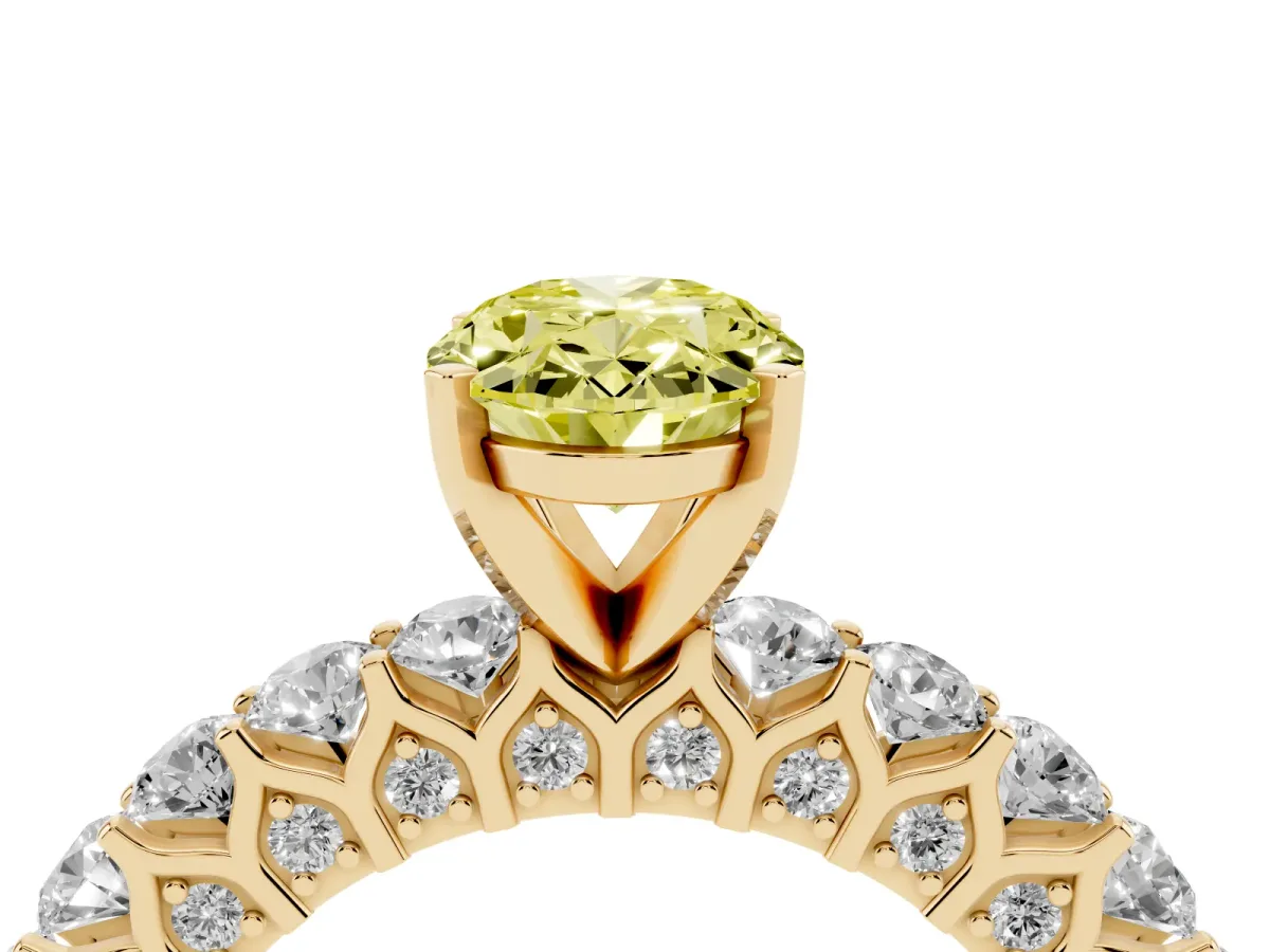 Fancy Yellow Oval Cut Diamond Solitaire Ring with Shared Prong Pavé Band and Four-Prong Setting Yellow gold