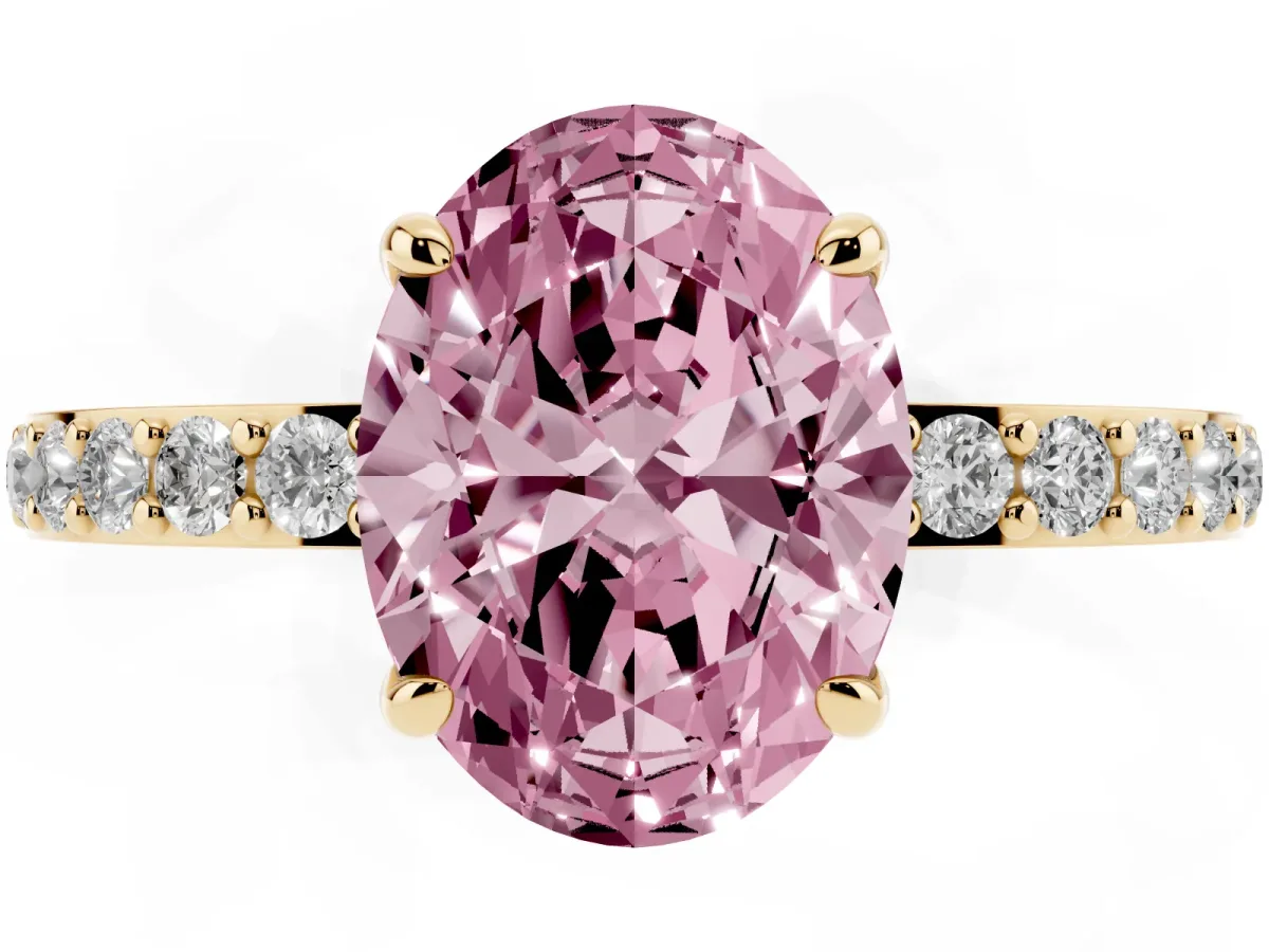 Fancy Pink Oval Cut Diamond Pavé Engagement Ring with Round Accents and Prong Setting Yellow gold