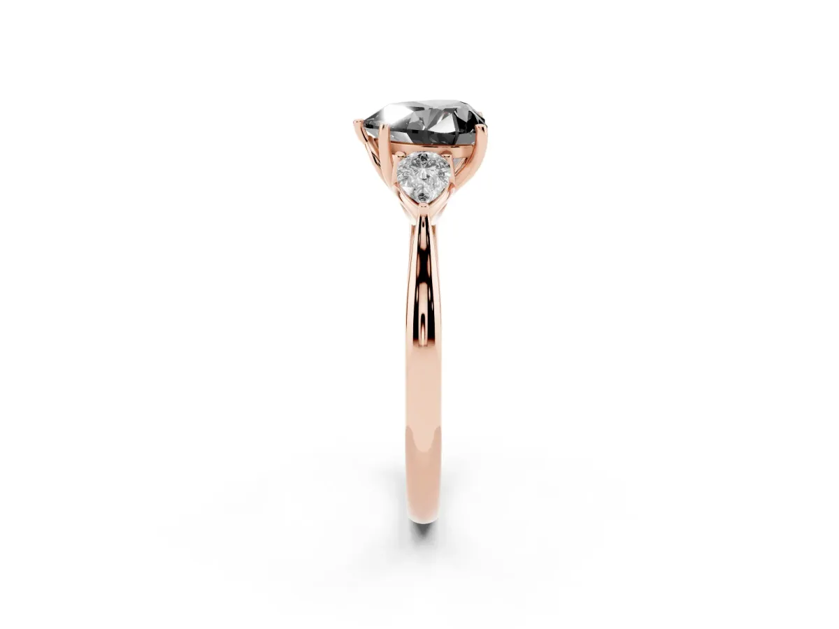 Fancy Black Three-Stone Heart Cut Brilliant Diamond Solitaire Ring with Tapered Band and Four-Prong Setting Rose gold
