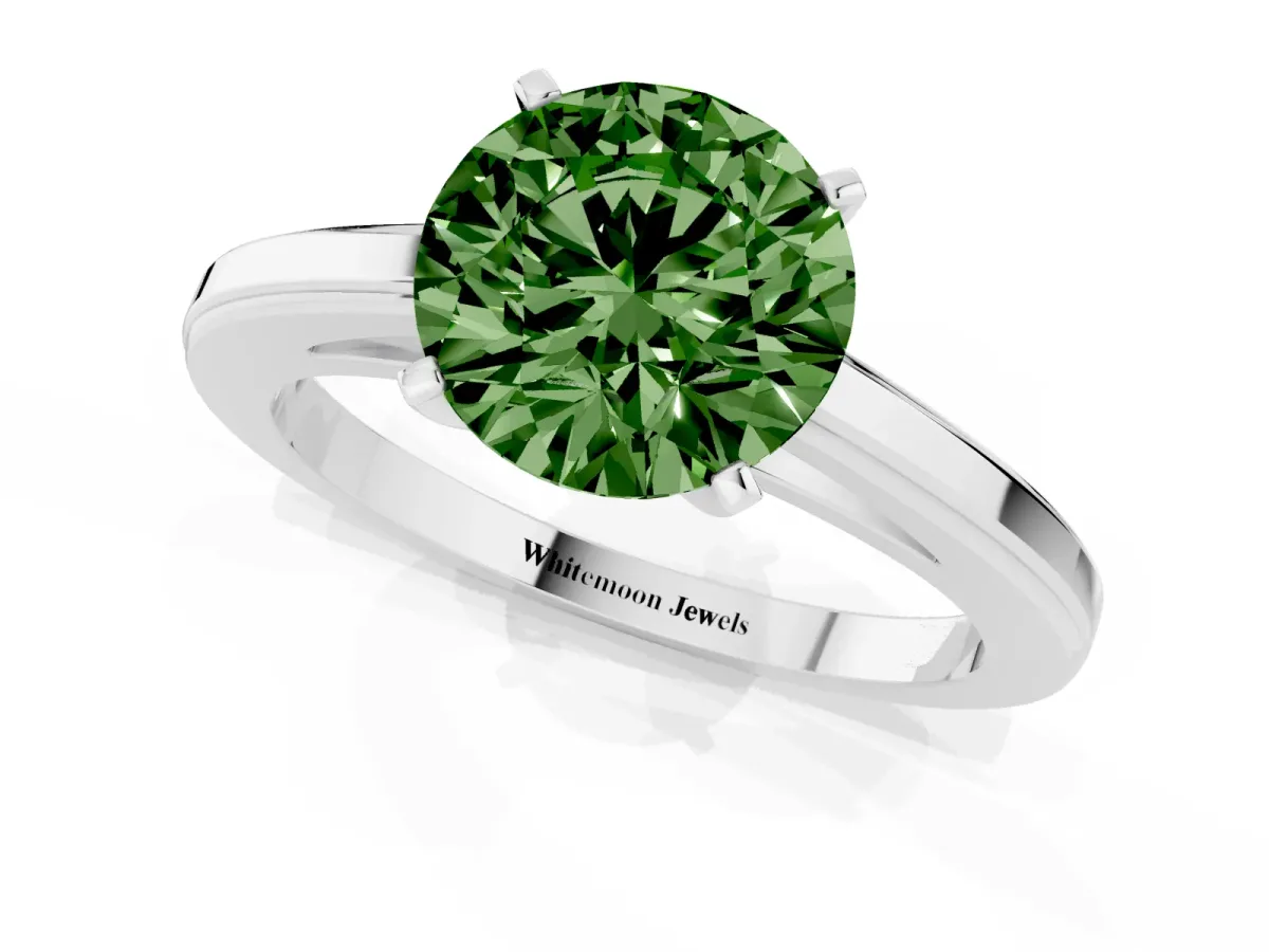 Fancy Green Round Cut Solitaire Diamond Ring with Four-Prong Setting and Classic Band Silver