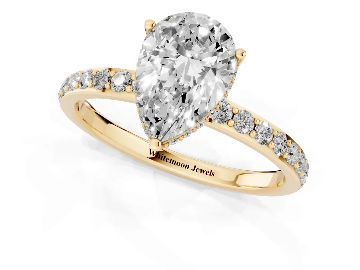 Pear Cut Diamond Solitaire Ring with Pavé Band and Hidden Halo Yellow gold