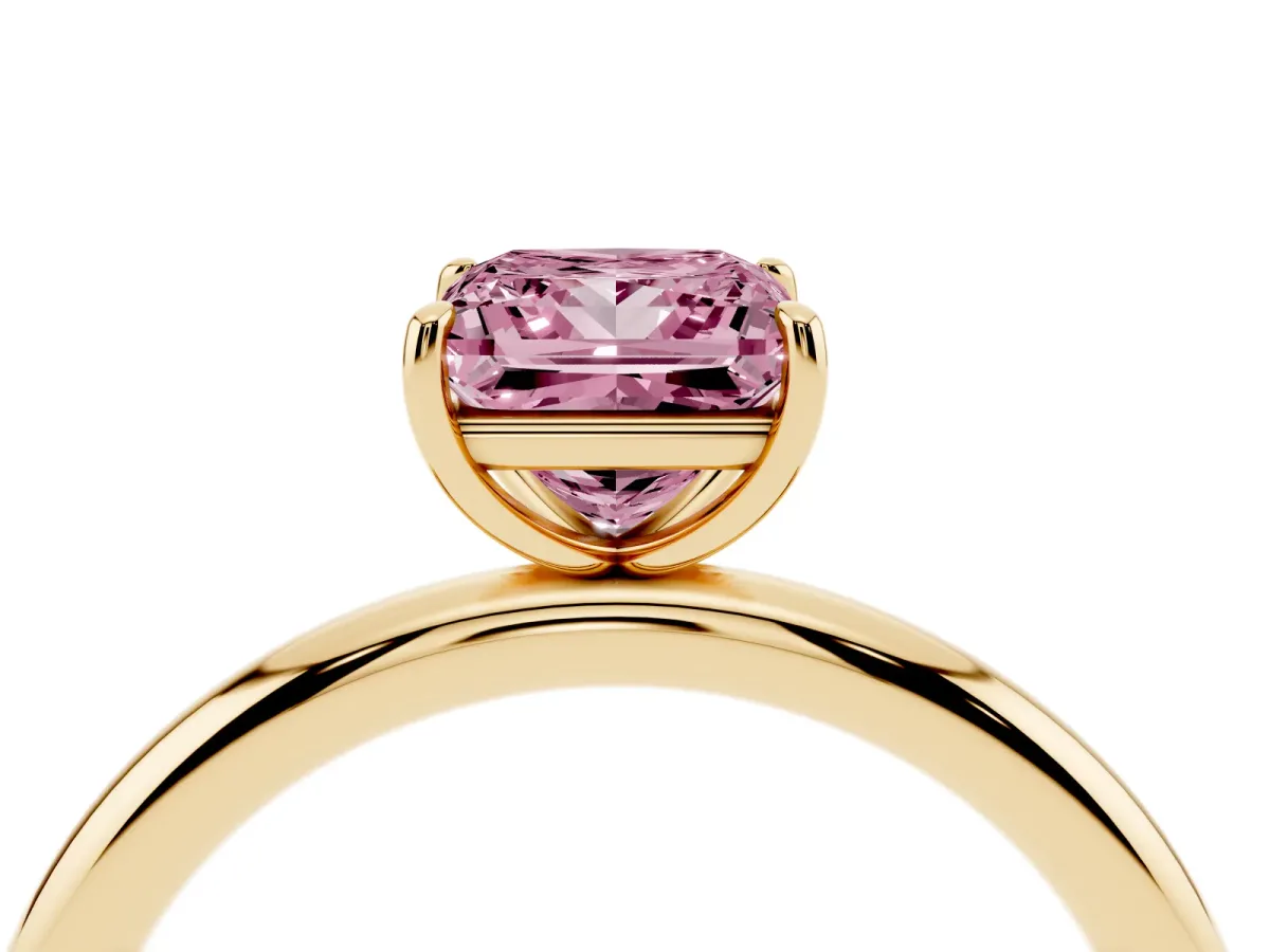 Fancy Pink Princess Cut Solitaire Diamond Ring with Four-Prong Setting on a Plain Band Yellow gold