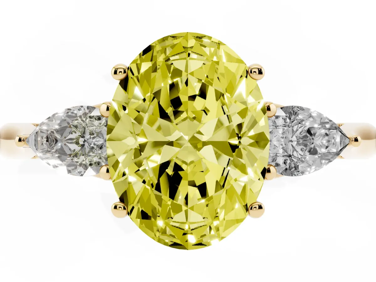 Fancy Yellow Three-Stone Oval Cut Brilliant Diamond Solitaire Ring with Tapered Band and Four-Prong Setting Yellow gold