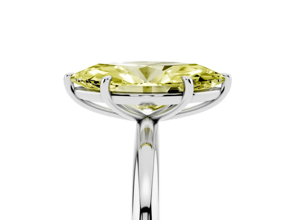 Fancy Yellow Marquise Cut Solitaire Diamond Ring with Four-Prong Setting on a Plain Band Platinum