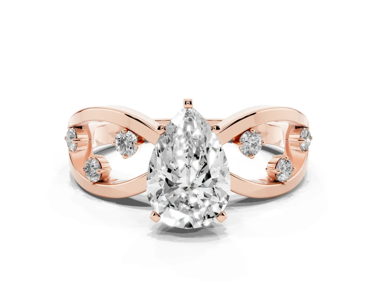 Pear Cut Cut Solitaire Diamond with Side Stones on Criss-Cross Band and Four-Prong Setting Rose gold