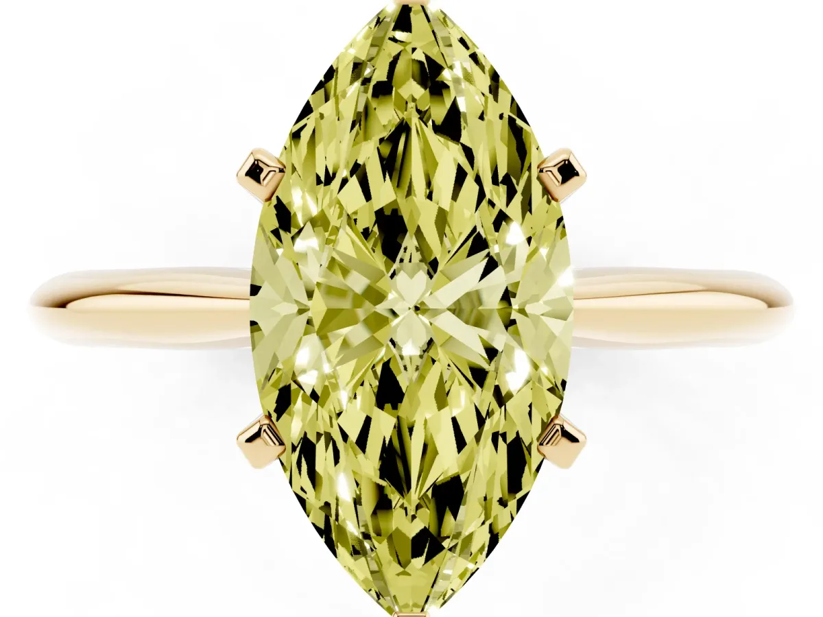 Fancy Yellow Marquise Cut Cut Solitaire Ring with Four-Prong Setting on a Classic Band Yellow gold