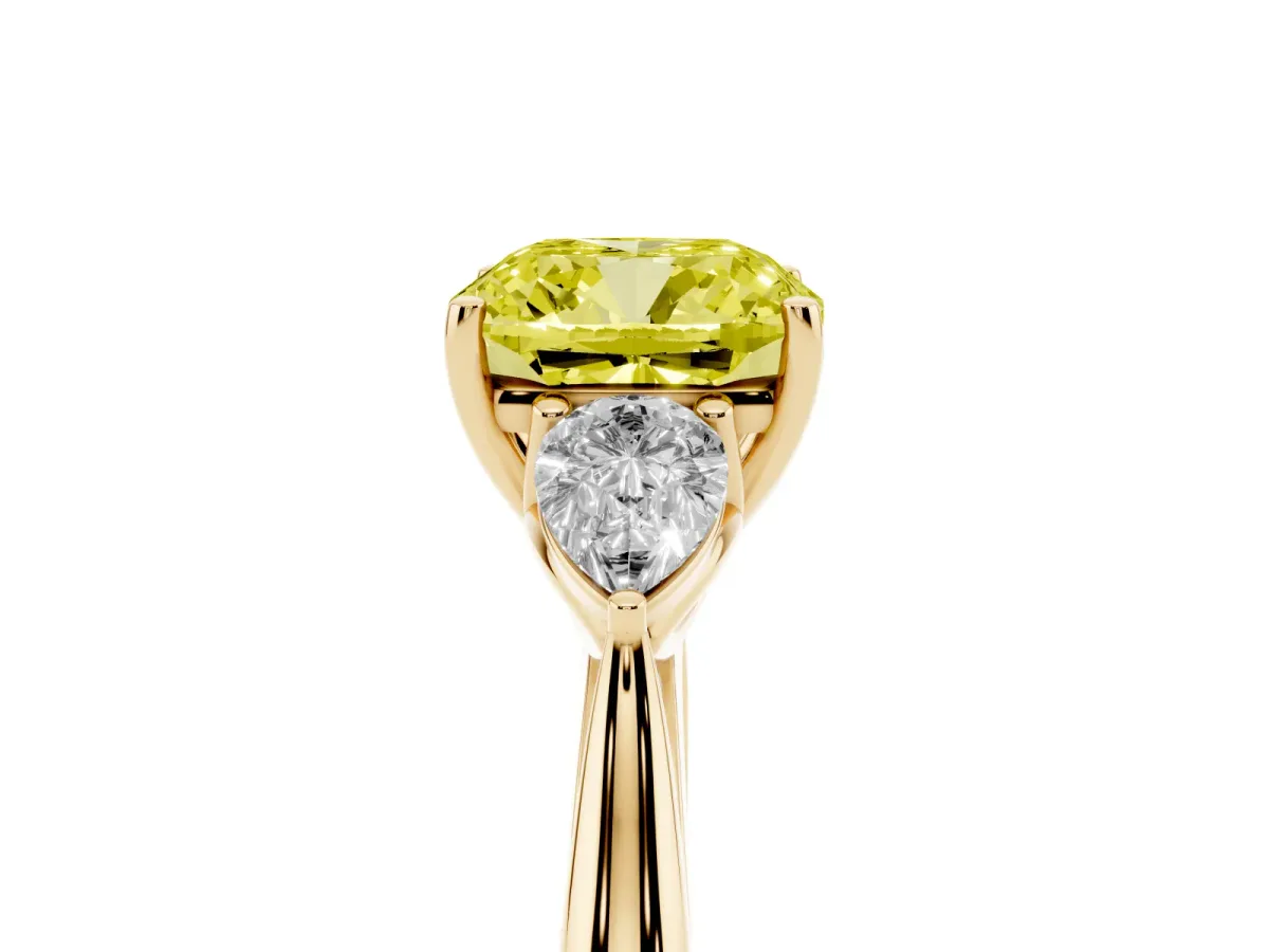 Fancy Yellow Cushion Cut Diamond Three-Stone Ring with Pear Side Stones and Prong Setting Yellow gold