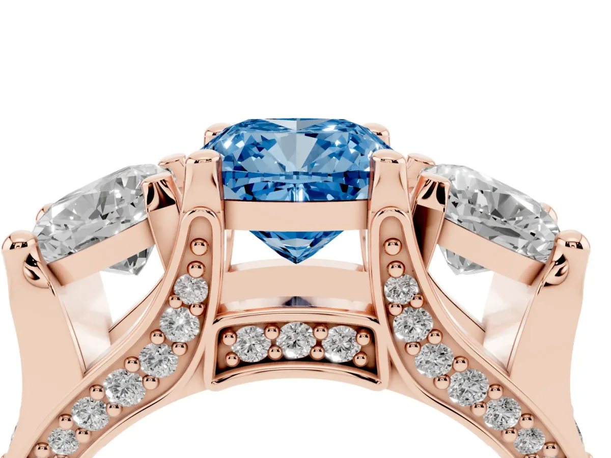 Fancy Blue Cushion Cut Diamond Three-Stone Ring with Channel Set Band and Four-Prong Setting Rose gold