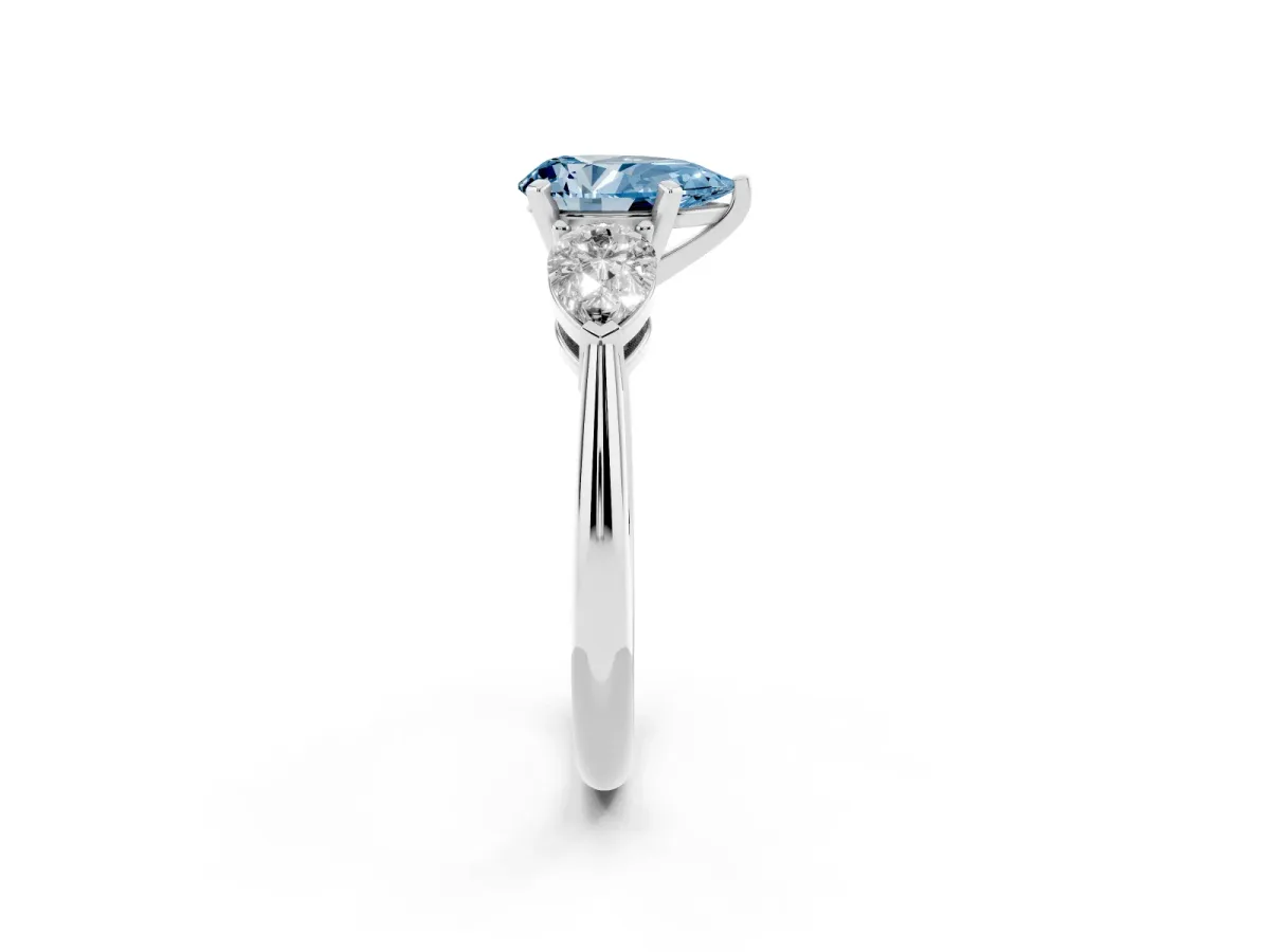 Fancy Blue Three-Stone Pear Cut Diamond Ring with Pear Side Stones and Four-Prong Setting Silver