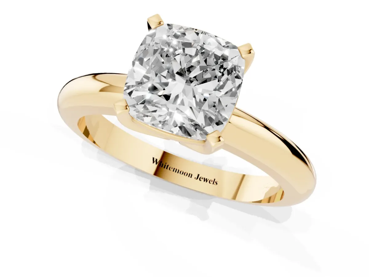 Cushion Cut Diamond Solitaire Engagement Ring with Round Band and Four-Prong Setting Yellow gold