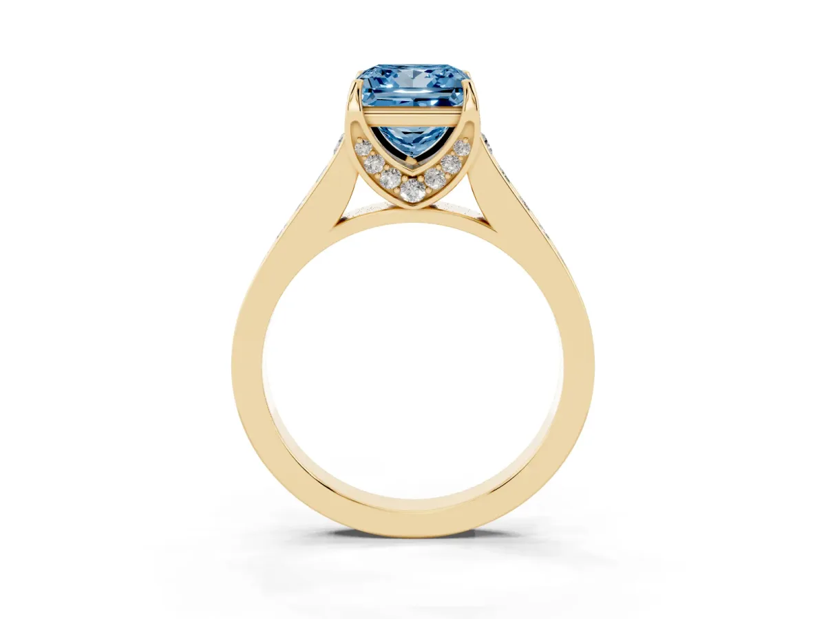 Fancy Blue Princess Cut Brilliant Cut Diamond Engagement Ring with Pavé Band and Four-Prong Setting Yellow gold