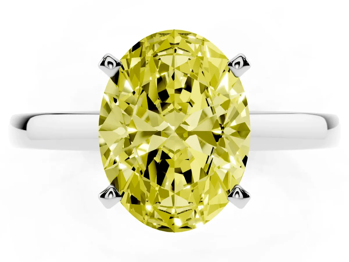 Fancy Yellow Oval Cut Solitaire Diamond Engagement Ring with Four-Prong Setting on a Classic Band Silver