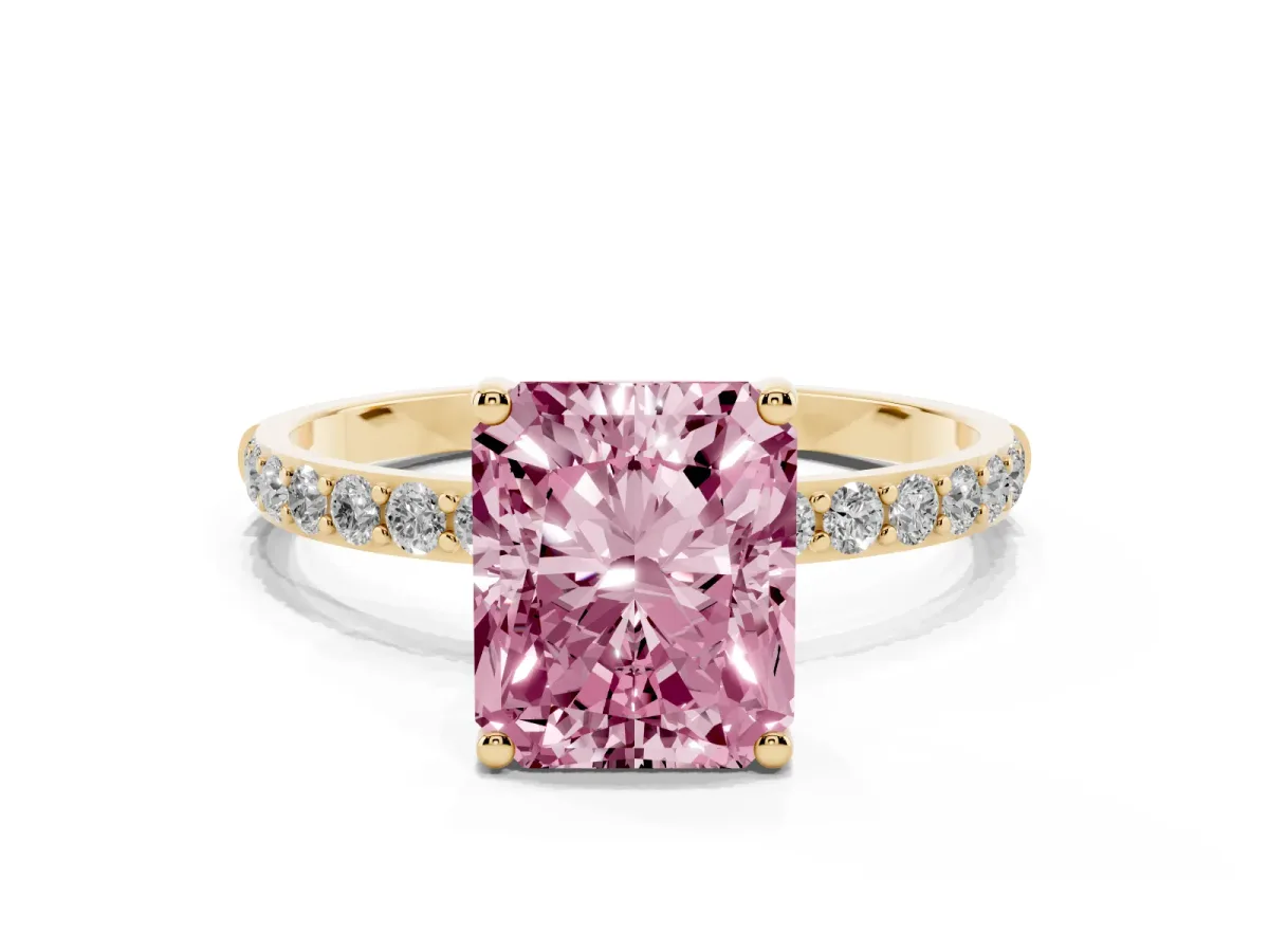 Fancy Pink Radiant Cut Diamond Solitaire Ring with Round Pavé Shoulders and Prong Setting Yellow gold
