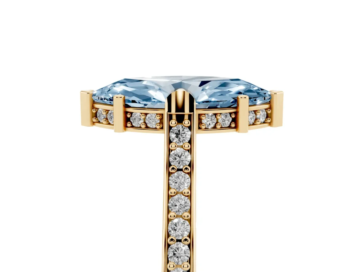 Fancy Blue Marquise Cut Solitaire Diamond Ring with Channel Set Band and Bezel Prong Setting Yellow gold