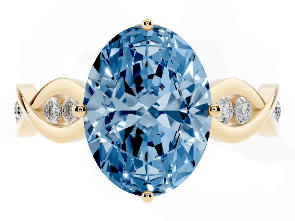 Fancy Blue Oval Cut Solitaire Twist Band with Leaf Prong Setting Yellow gold