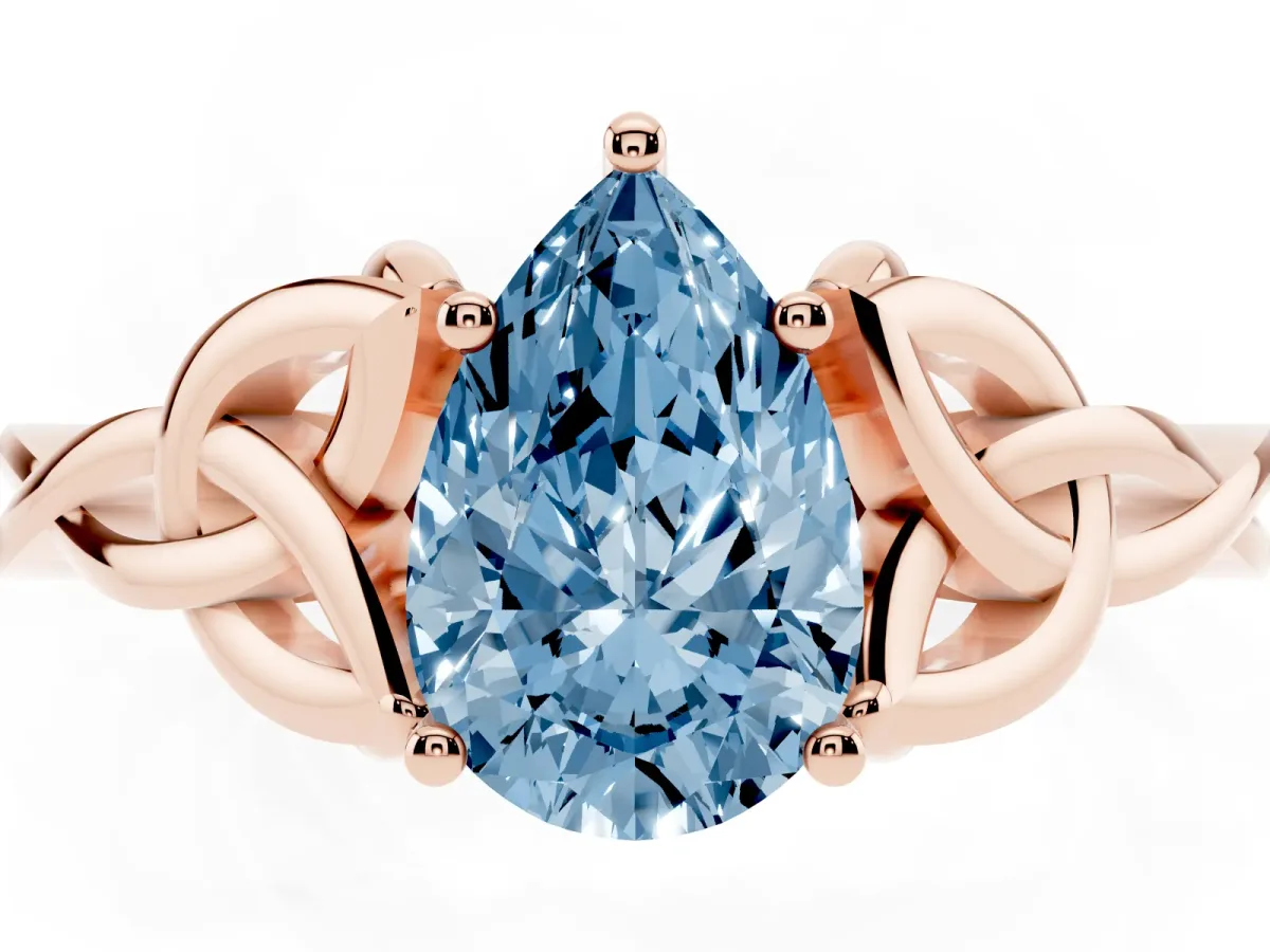 Fancy Blue Pear Cut Diamond Solitaire Engagement Ring with Celtic Knot Band and Four-Prong Setting Rose gold