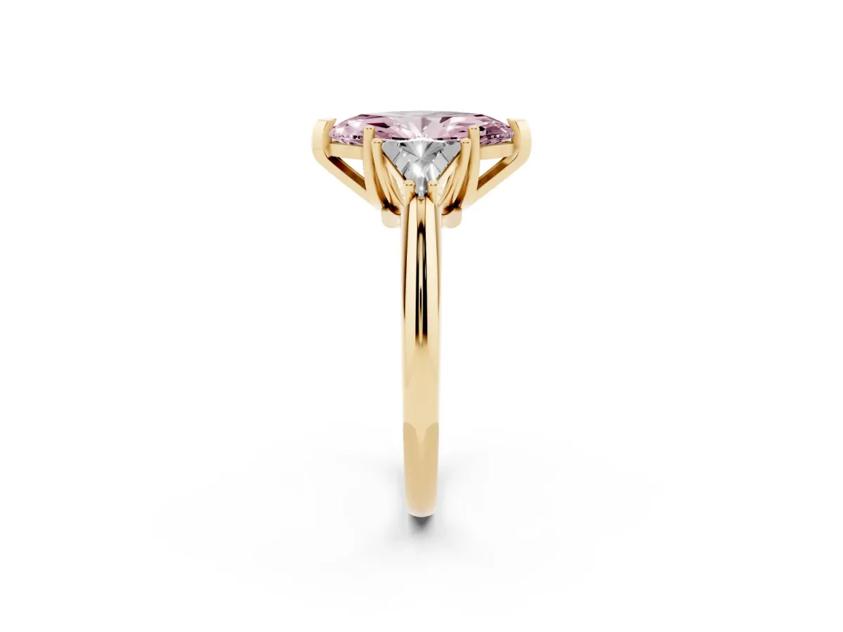 Fancy Pink Three-Stone Marquise Cut Diamond Engagement Ring with Trillion Side Stones and Prong Setting Yellow gold