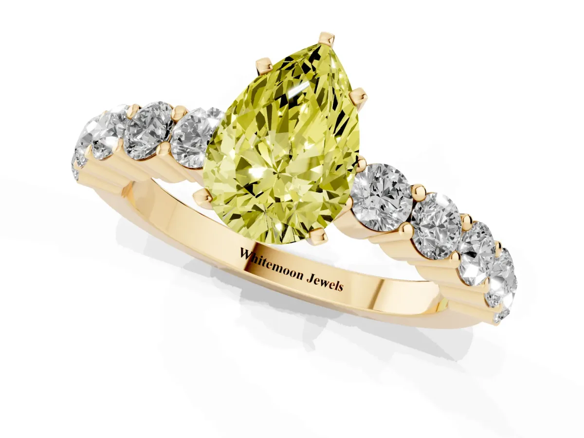 Fancy Yellow Pear Cut Diamond Solitaire Ring with Shared Prong Round Side Stones Yellow gold