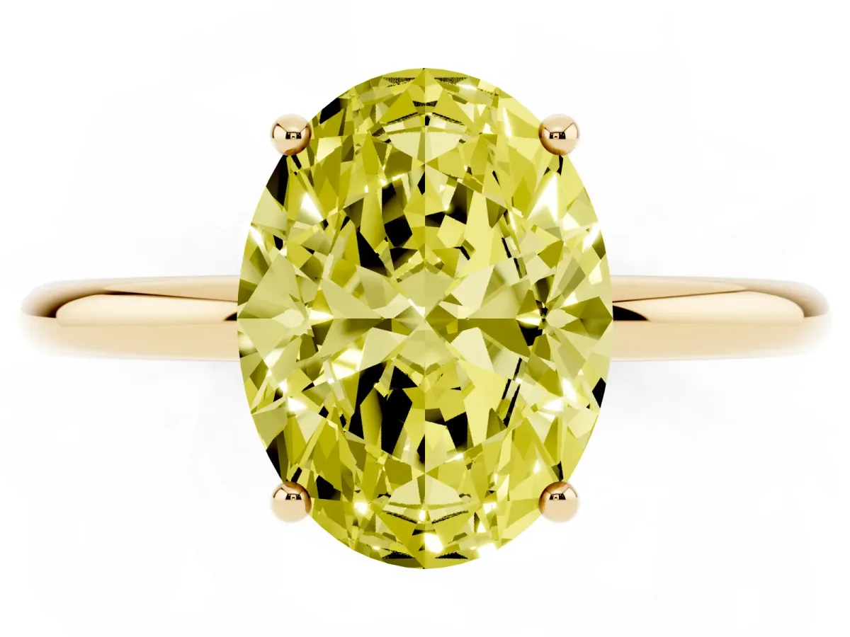 Fancy Yellow Oval Cut Solitaire Diamond Ring with a Classic Band and Four-Prong Setting Yellow gold