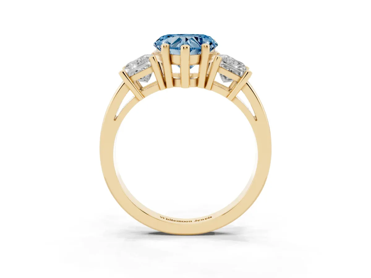 Fancy Blue Three-Stone Heart Cut Cut Solitaire Ring with Prong Setting Yellow gold