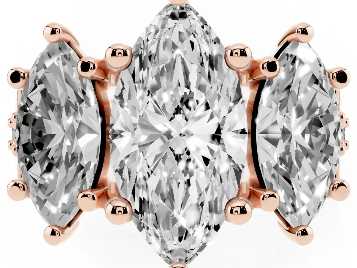 Marquise Cut Diamond Three-Stone Ring with Channel Set Band and Four-Prong Setting Rose gold