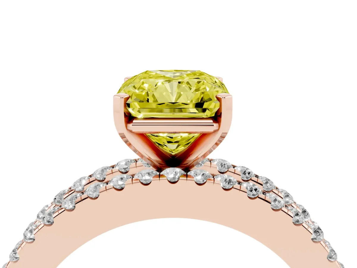 Fancy Yellow Radiant Cut Diamond Solitaire Ring with Pavé and Channel Set Band Rose gold