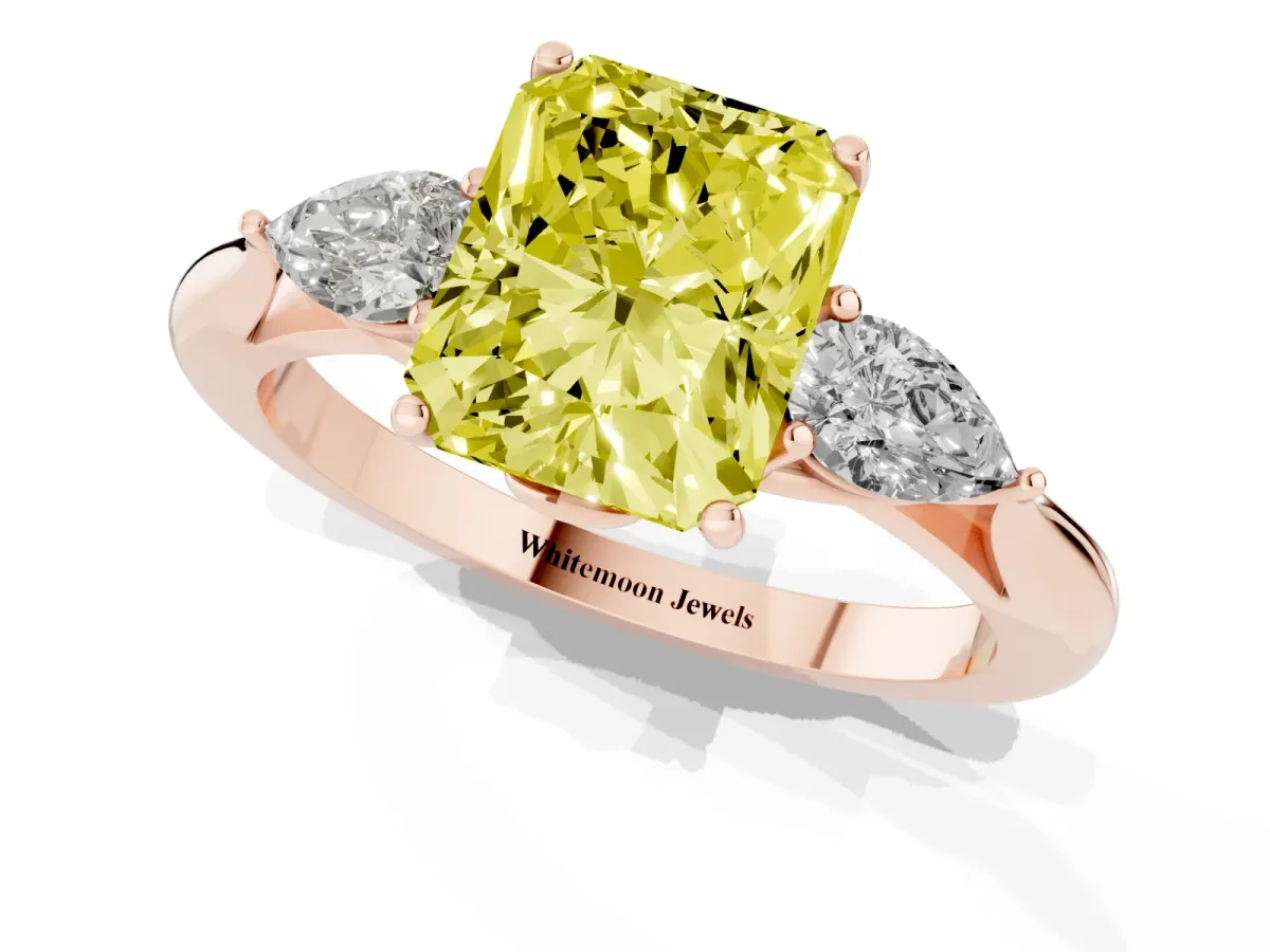 Fancy Yellow Three-Stone Radiant Cut Diamond Ring with Pear Side Stones in Four-Prong Setting Rose gold