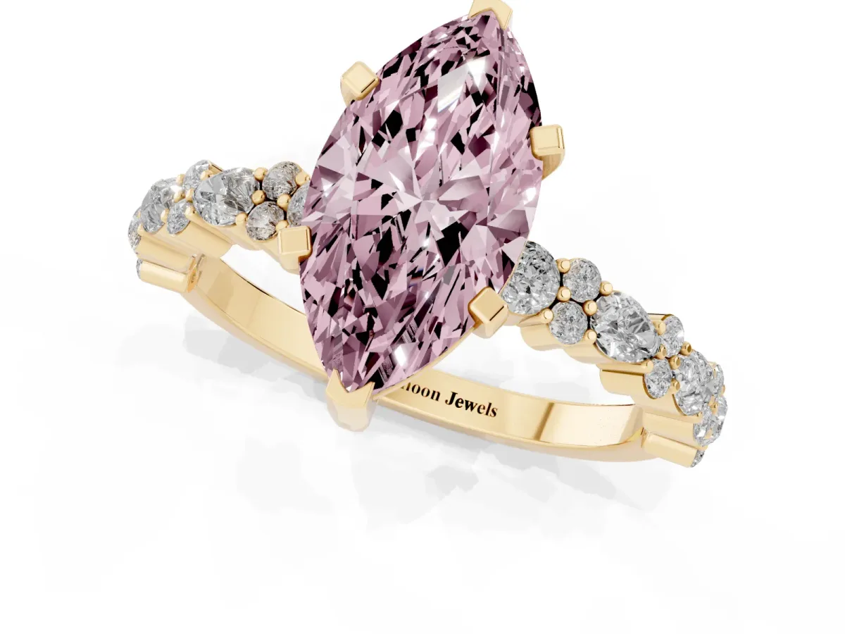 Fancy Pink Marquise Cut Diamond Side Stone Solitaire Ring with Round and Four-Prong Setting Yellow gold