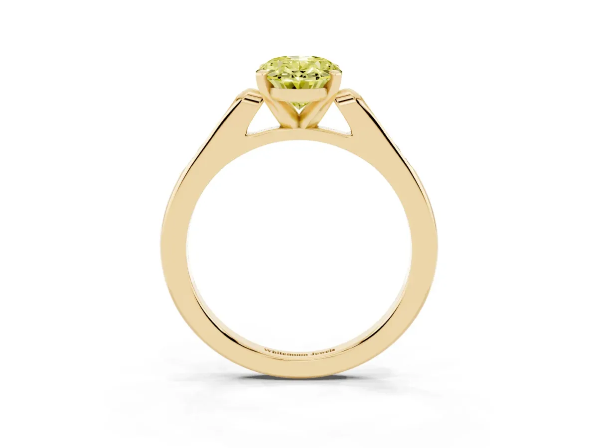 Fancy Yellow Oval Cut Diamond Solitaire Ring with Channel Set Round Band and Prong Setting Yellow gold