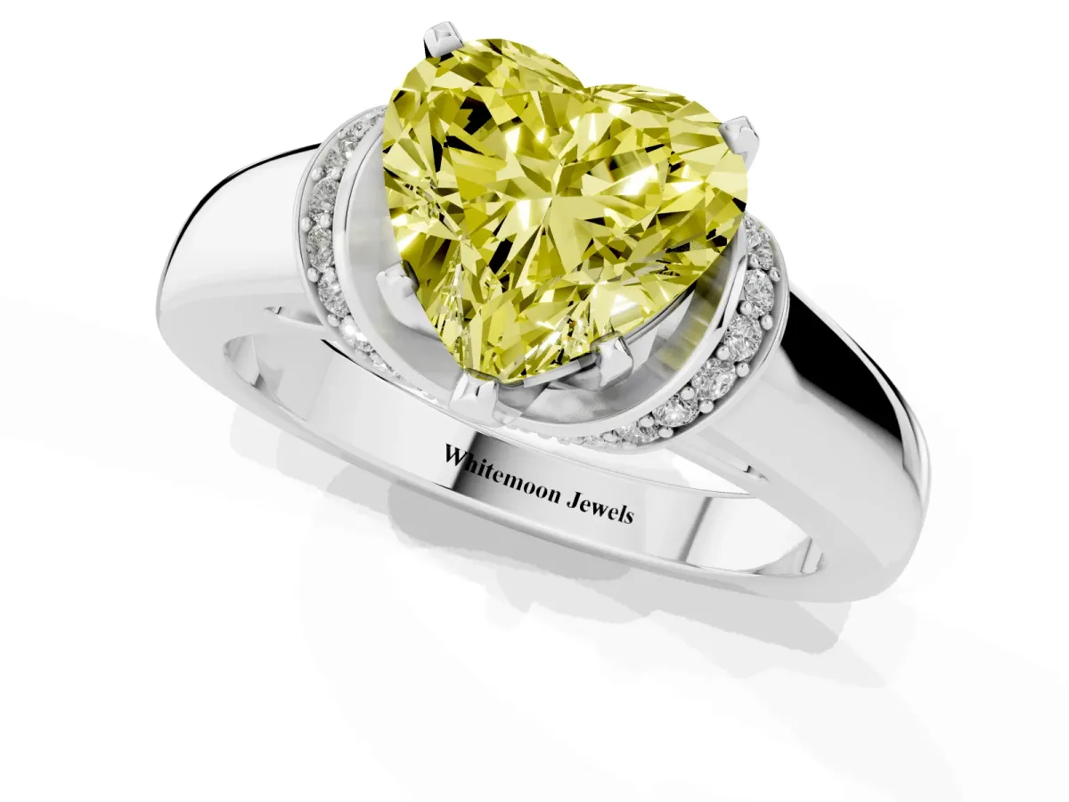 Fancy Yellow Heart Cut Solitaire Diamond Ring with Pave Band and Six-Prong Setting Platinum