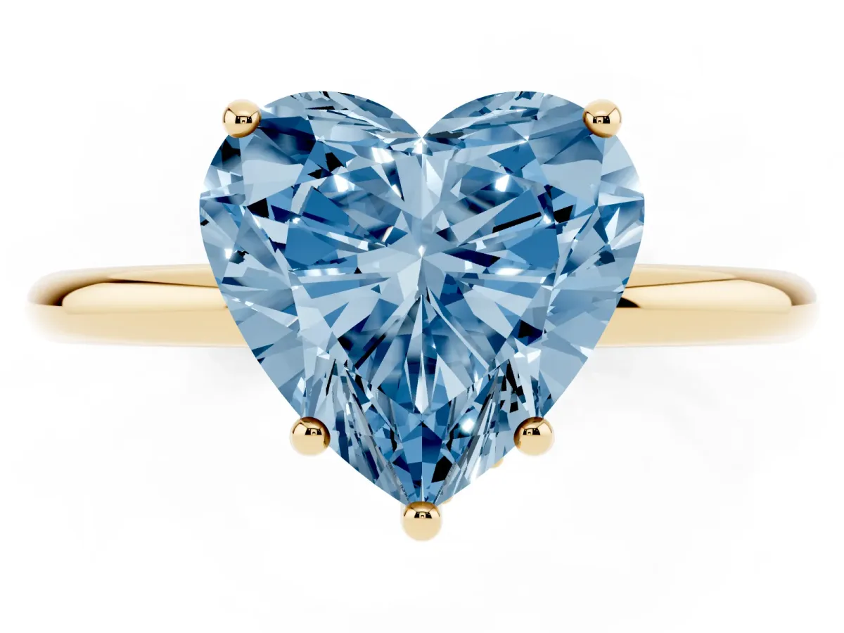 Fancy Blue Heart Cut Solitaire Diamond Ring with a Classic Band and Four-Prong Setting Yellow gold