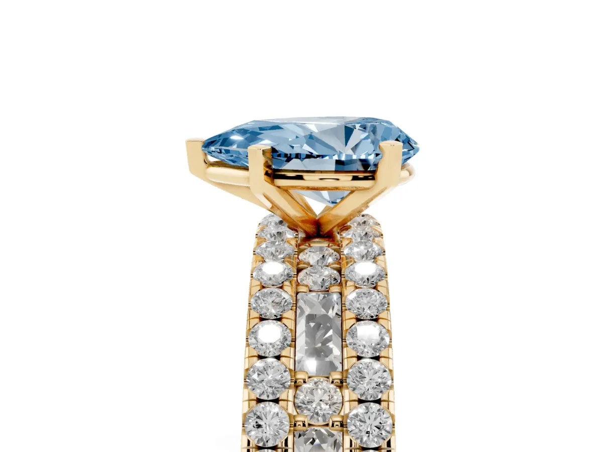 Fancy Blue Pear Cut Diamond Solitaire Ring with Pavé and Channel Set Band Yellow gold