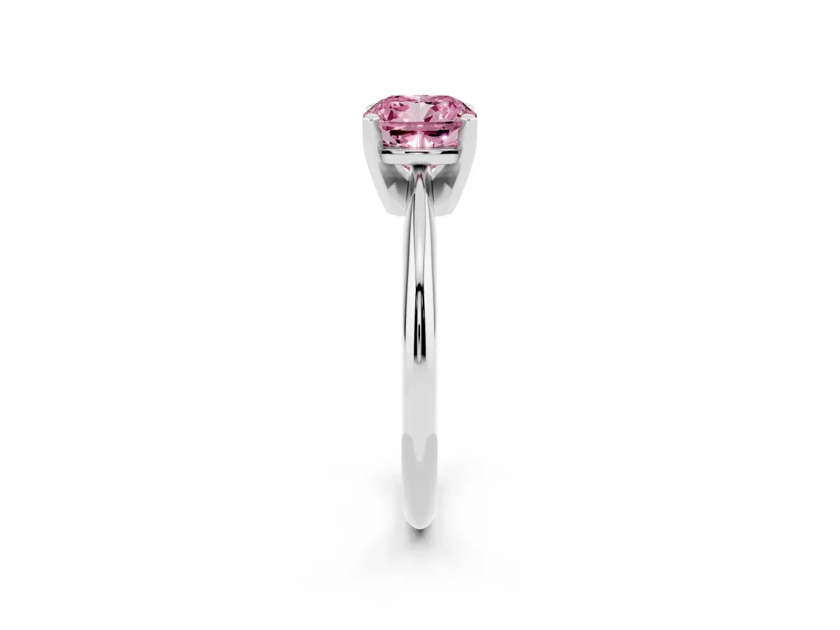 Fancy Pink Cushion Cut Cut Solitaire Ring with Four-Prong Setting on a Classic Band Silver