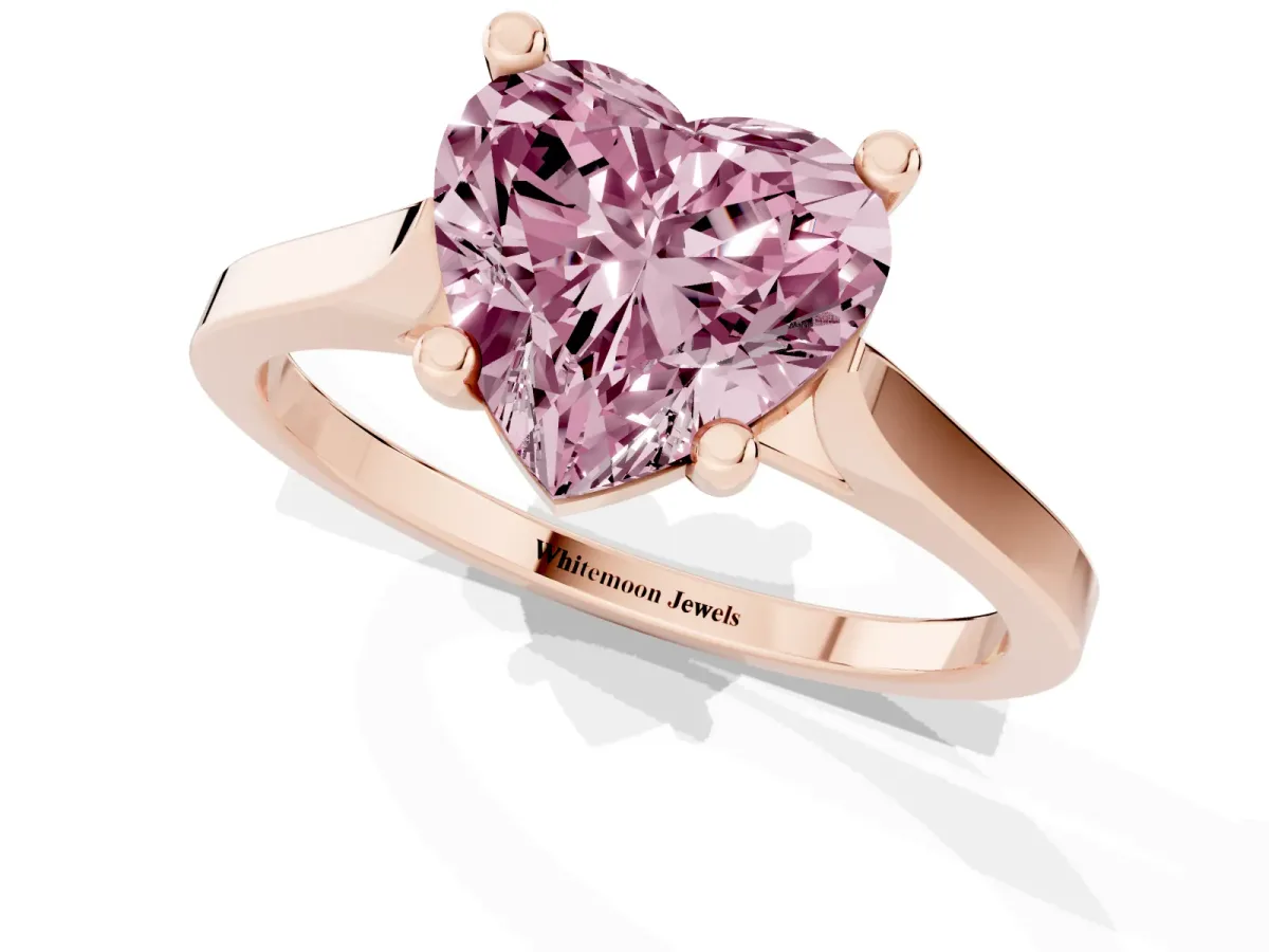 Fancy Pink Heart Cut Solitaire Diamond Ring with Four-Prong Setting and Tapered Band Rose gold