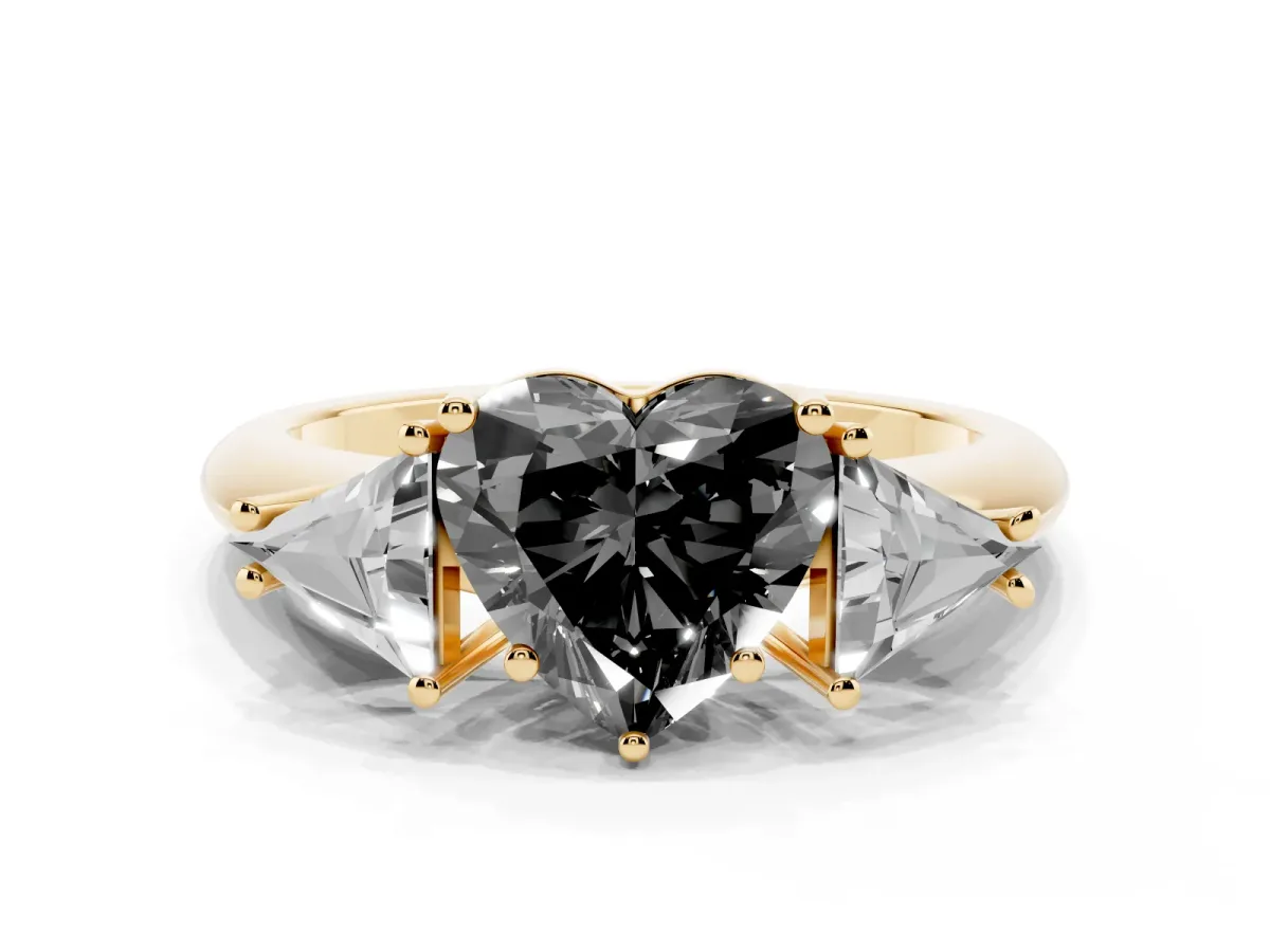 Fancy Black Three-Stone Heart Cut Diamond Engagement Ring with Trillion Side Stones and Prong Setting Yellow gold