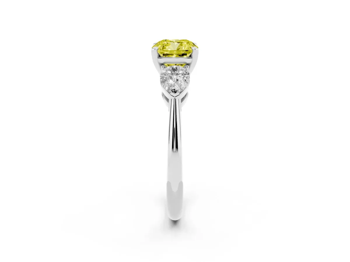 Fancy Yellow Three-Stone Cushion Cut Diamond Ring with Pear Side Stones and Four-Prong Setting Silver