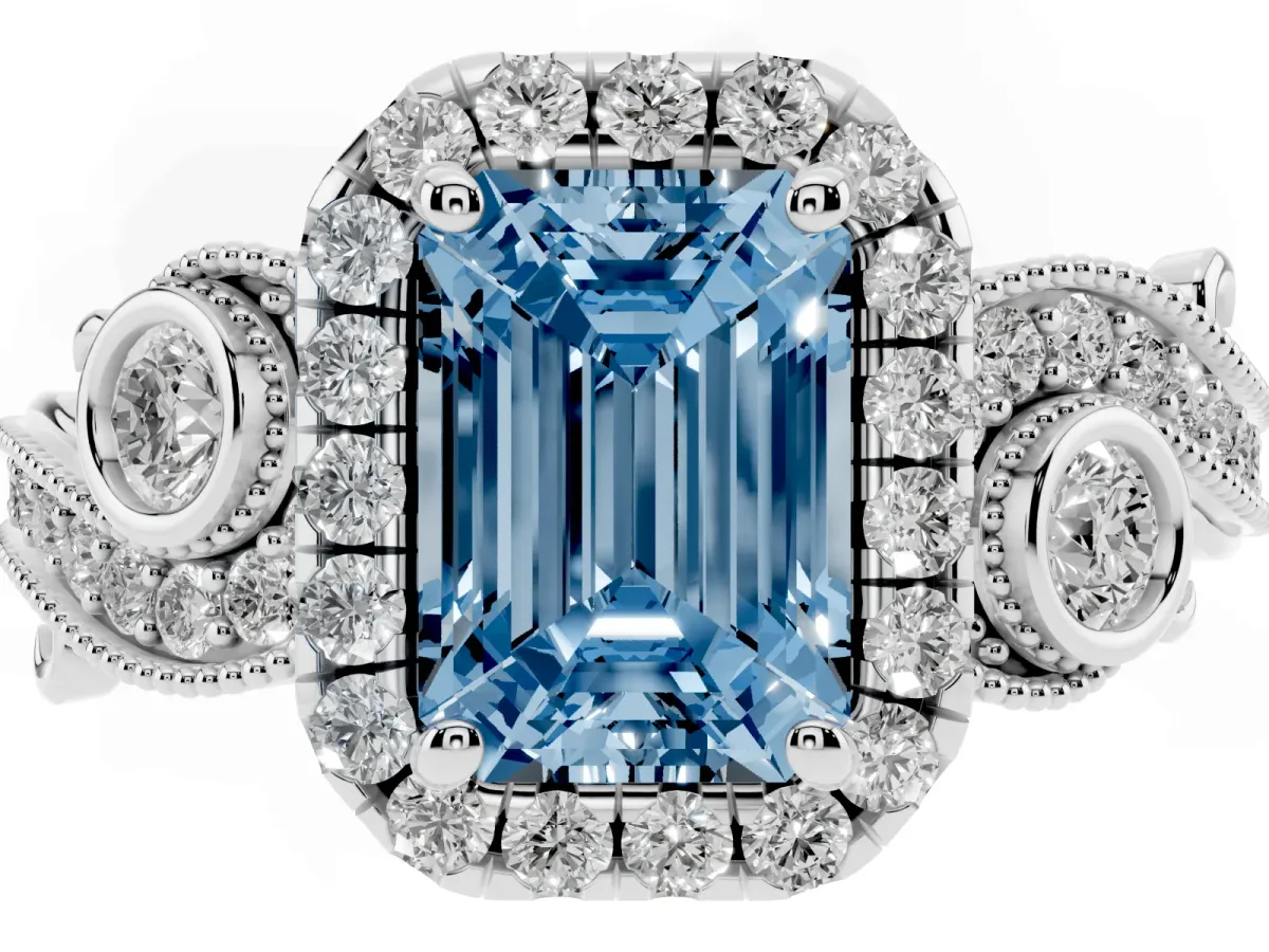Fancy Blue Emerald Cut Halo Diamond Ring with Milgrain and Bezel Accents on a Split Shank Band White gold