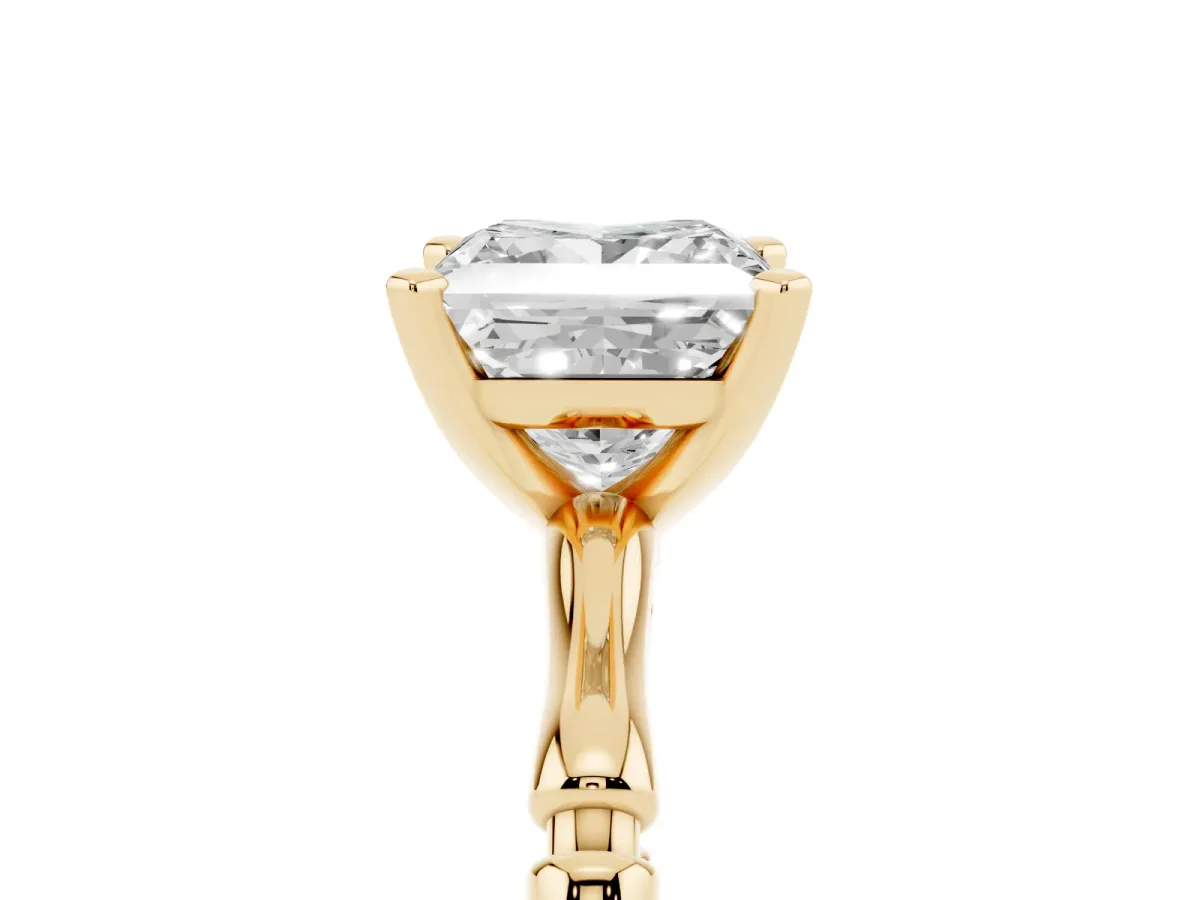 Princess Cut Solitaire Diamond Ring with Bamboo Band and Four-Prong Setting Yellow gold