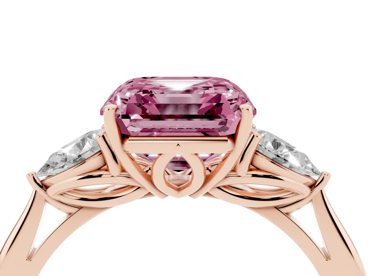 Fancy Pink Three-Stone Asscher Cut Diamond Ring with Pear Side Stones in Four-Prong Setting Rose gold