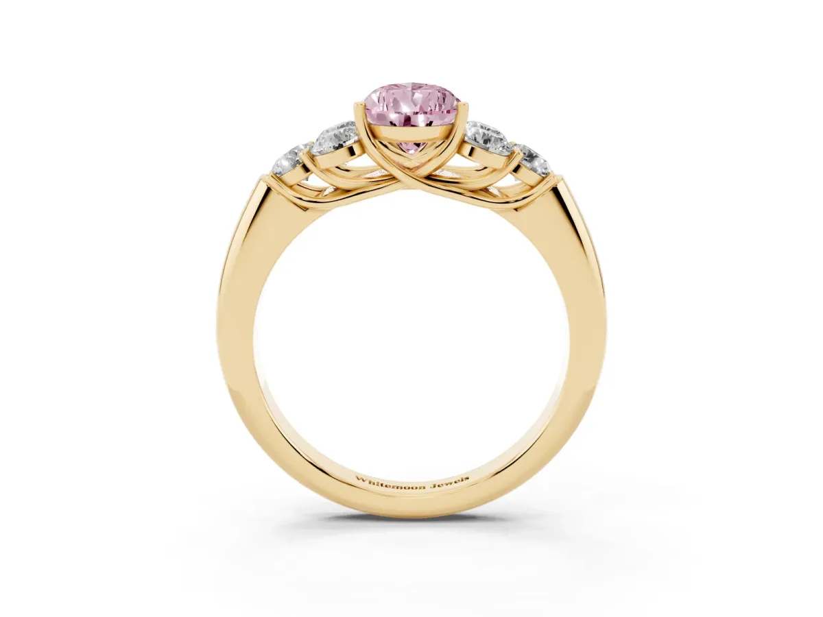 Fancy Pink Pear Cut Cut Diamond Cluster Ring with Round Accent Stones and Prong Setting on a Classic Band Yellow gold