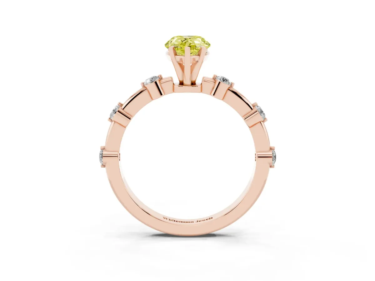 Fancy Yellow Pear Cut Solitaire Diamond Ring with Bezel Set Side Stones and Prong Setting Rose gold
