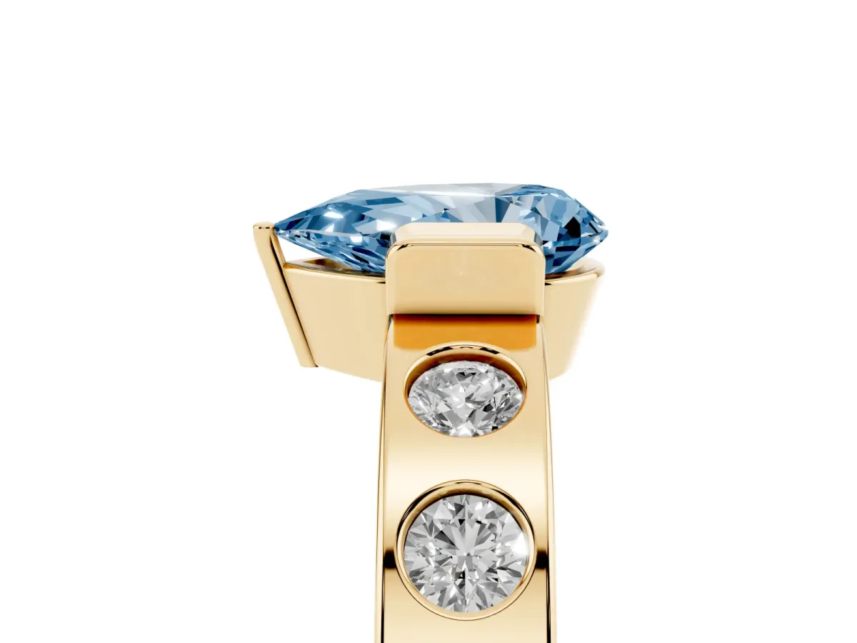 Fancy Blue Pear Cut Brilliant Channel-Set Diamond Ring with Bezel Prong Setting Yellow gold