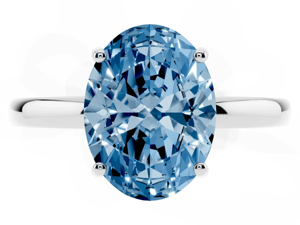 Fancy Blue Oval Cut Solitaire Diamond Ring with Prong Setting and Plain Band Platinum