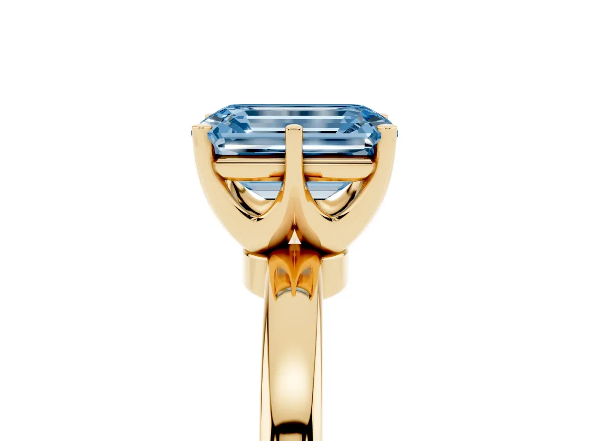 Fancy Blue Emerald Cut Solitaire Diamond Ring with Six-Prong Setting on a Classic Band Yellow gold
