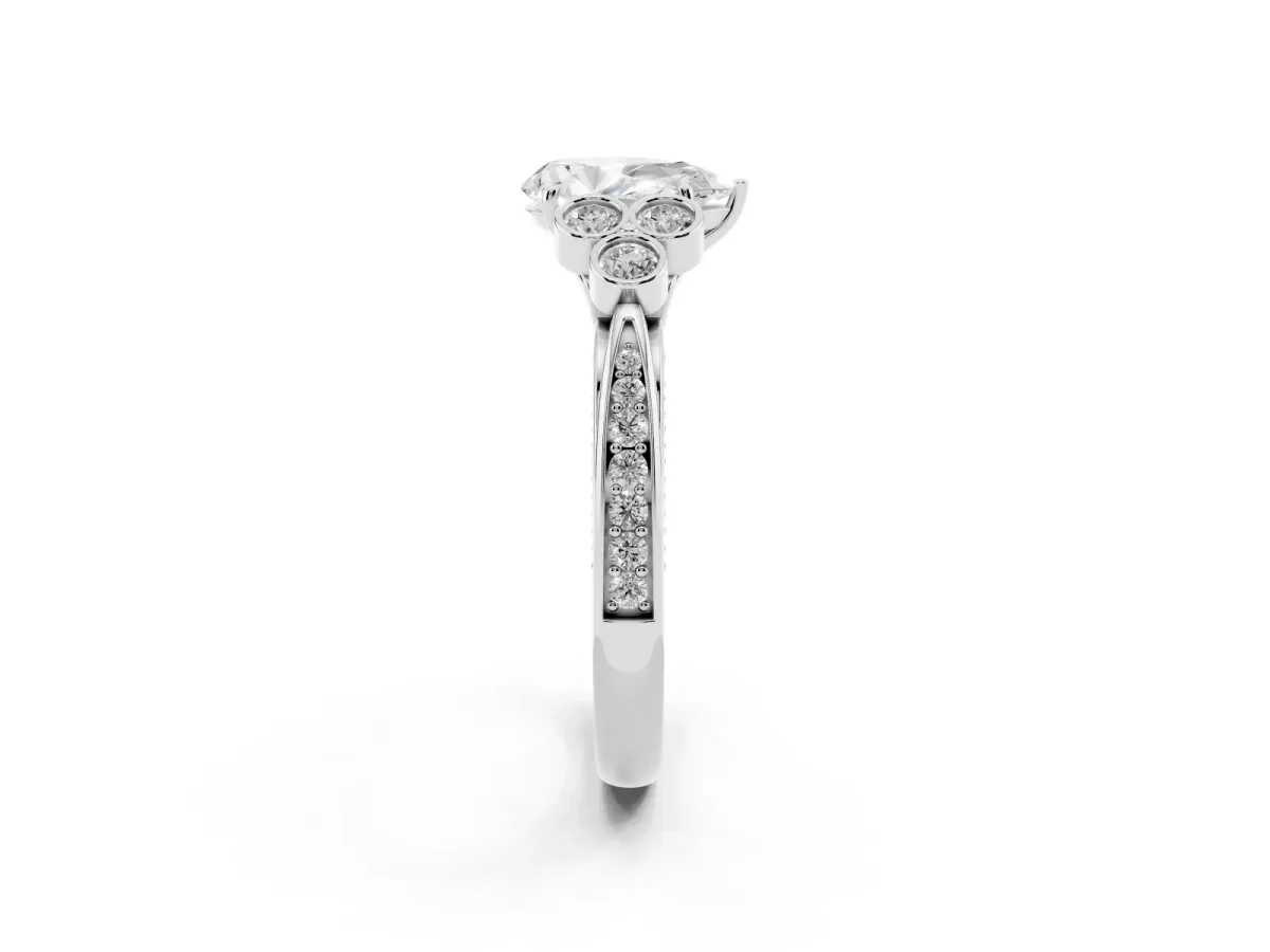 Pear Cut Cut Diamond Engagement Ring with Bezel Set Round Side Stones and Prong Setting Silver